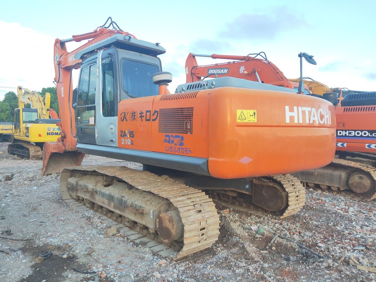 Hitachi Zaxis 210G crawler excavator, rear three-quarter view