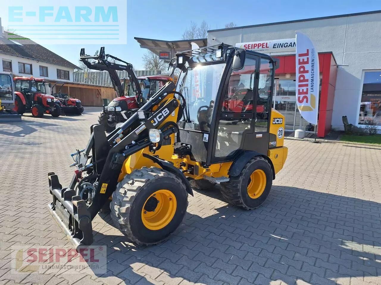 2024 JCB 403PLUS wheel loader, front three-quarter view 2024 JCB 403PLUS wheel loader, front three-quarter view