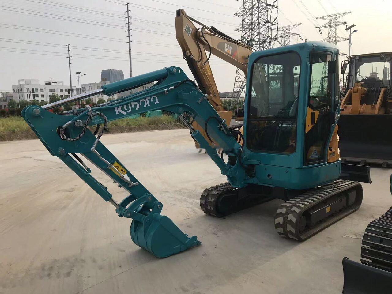 2022 Kubota U25 mini excavator, side view 2022 Kubota U25 mini excavator, side view