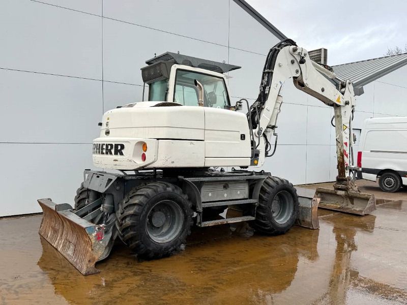 2011 Liebherr A 309 wheel excavator, rear three-quarter view