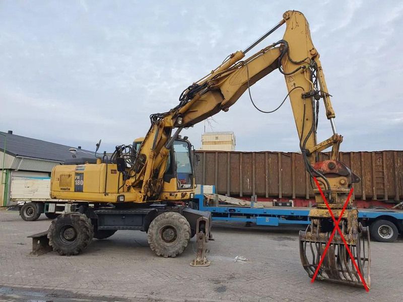 2006 Komatsu PW180-7K wheel excavator side view 2006 Komatsu PW180-7K wheel excavator side view