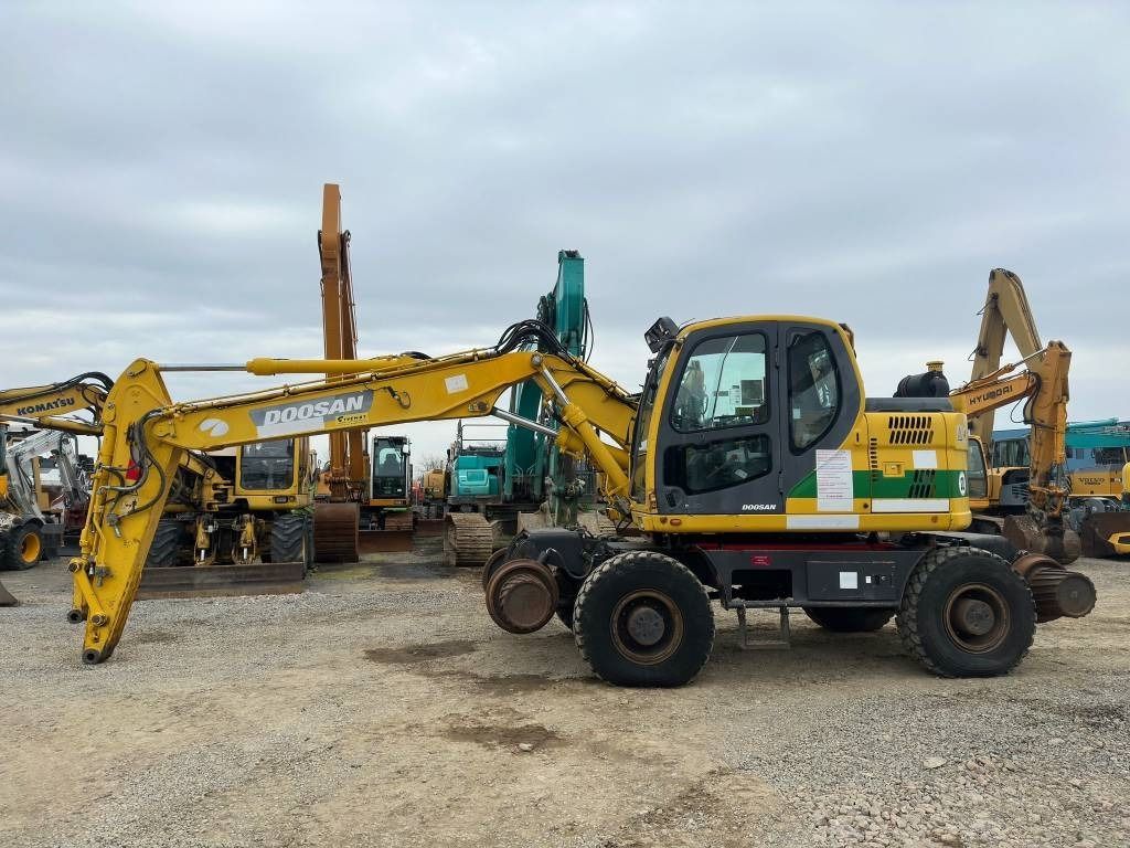 2010 Doosan DX160WR wheel excavator side view 2010 Doosan DX160WR wheel excavator side view