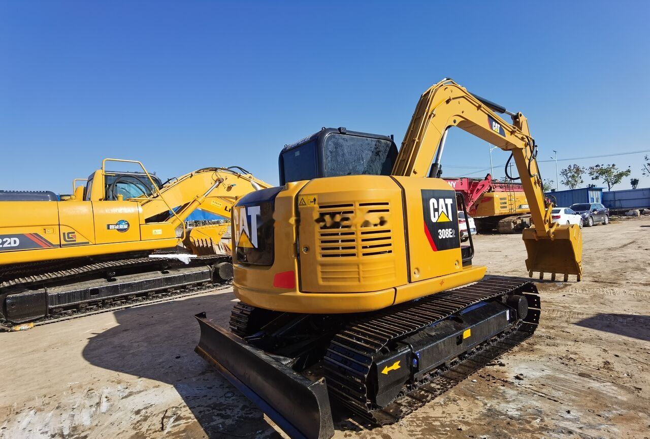 2020 Caterpillar 308E2 mini excavator rear three-quarter view 2020 Caterpillar 308E2 mini excavator rear three-quarter view