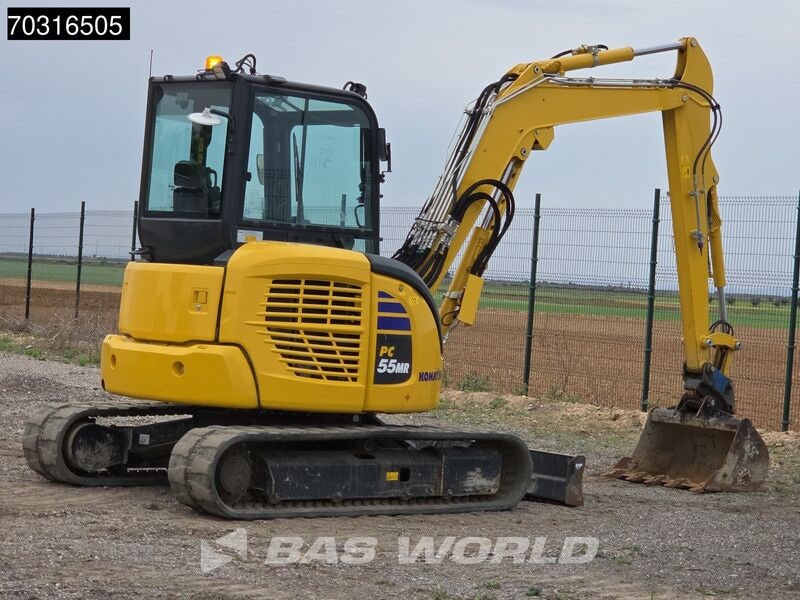 2024 Komatsu PC55MR-5 mini excavator, rear three-quarter view 2024 Komatsu PC55MR-5 mini excavator, rear three-quarter view