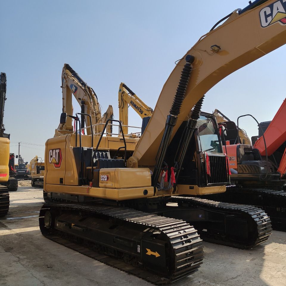 2024 Caterpillar 320GC crawler excavator, rear three-quarter view