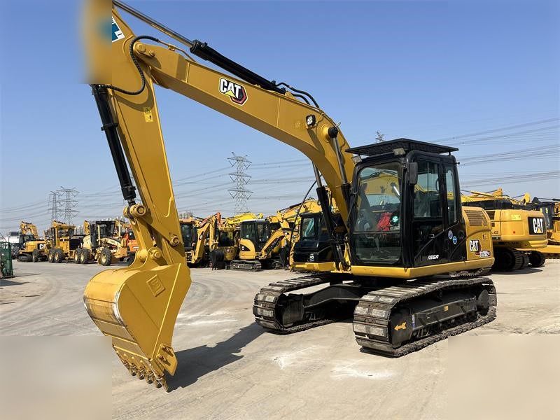 2023 Caterpillar 312D2 GC crawler excavator, front three-quarter view 2023 Caterpillar 312D2 GC crawler excavator, front three-quarter view