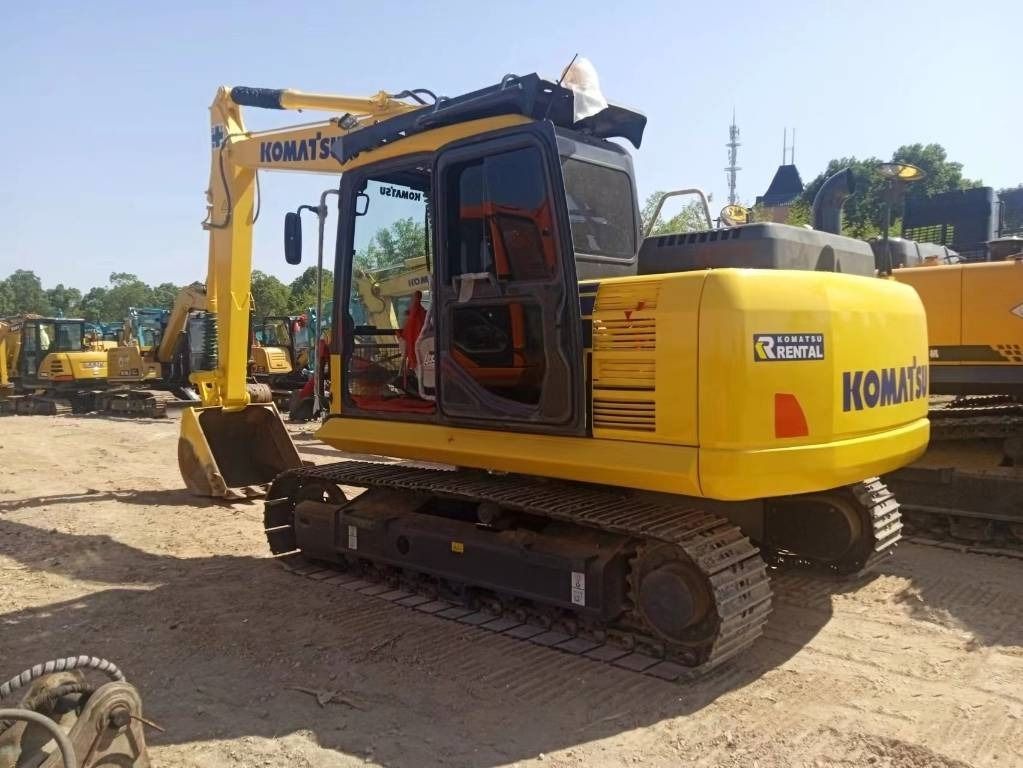 2024 Komatsu PC130-7 crawler excavator, rear three-quarter view 2024 Komatsu PC130-7 crawler excavator, rear three-quarter view