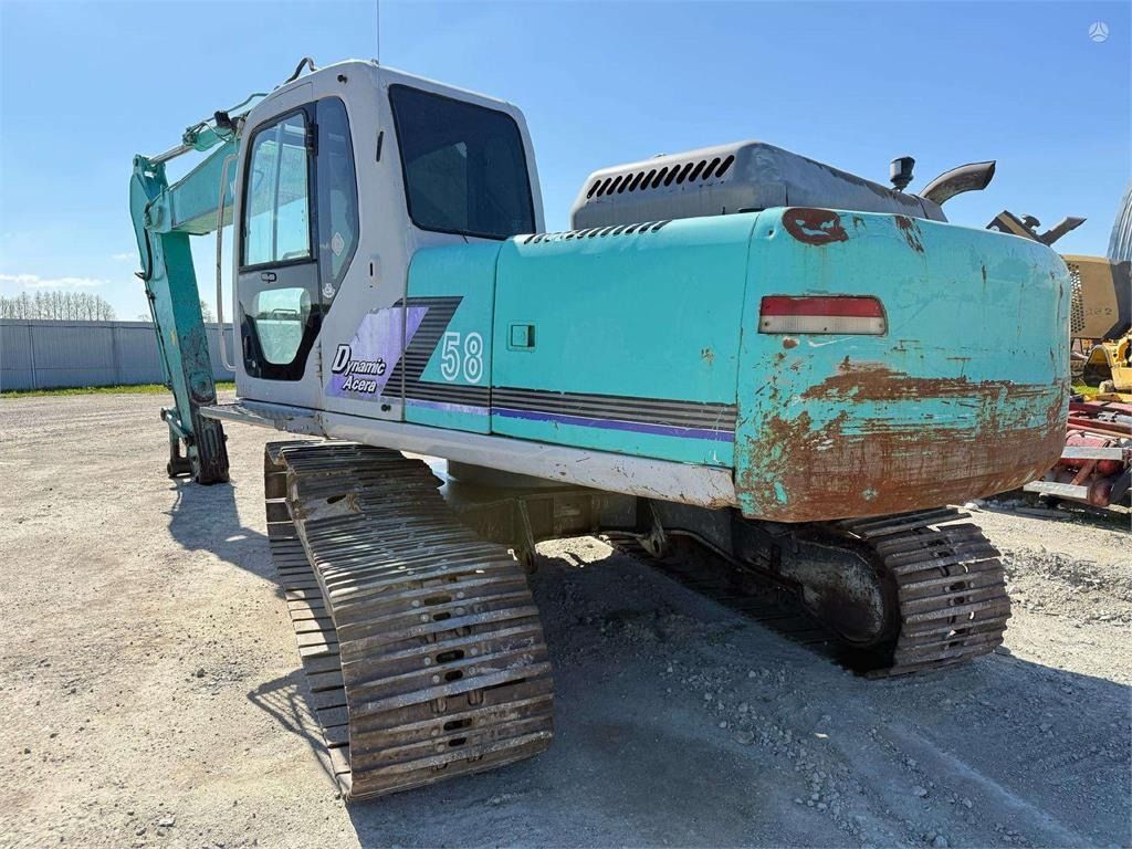 2001 Kobelco Dynamic Acera 58 crawler excavator, rear three-quarter view 2001 Kobelco Dynamic Acera 58 crawler excavator, rear three-quarter view