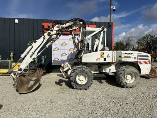 2005 Mecalac 12MXT wheel excavator, side profile view 2005 Mecalac 12MXT wheel excavator, side profile view