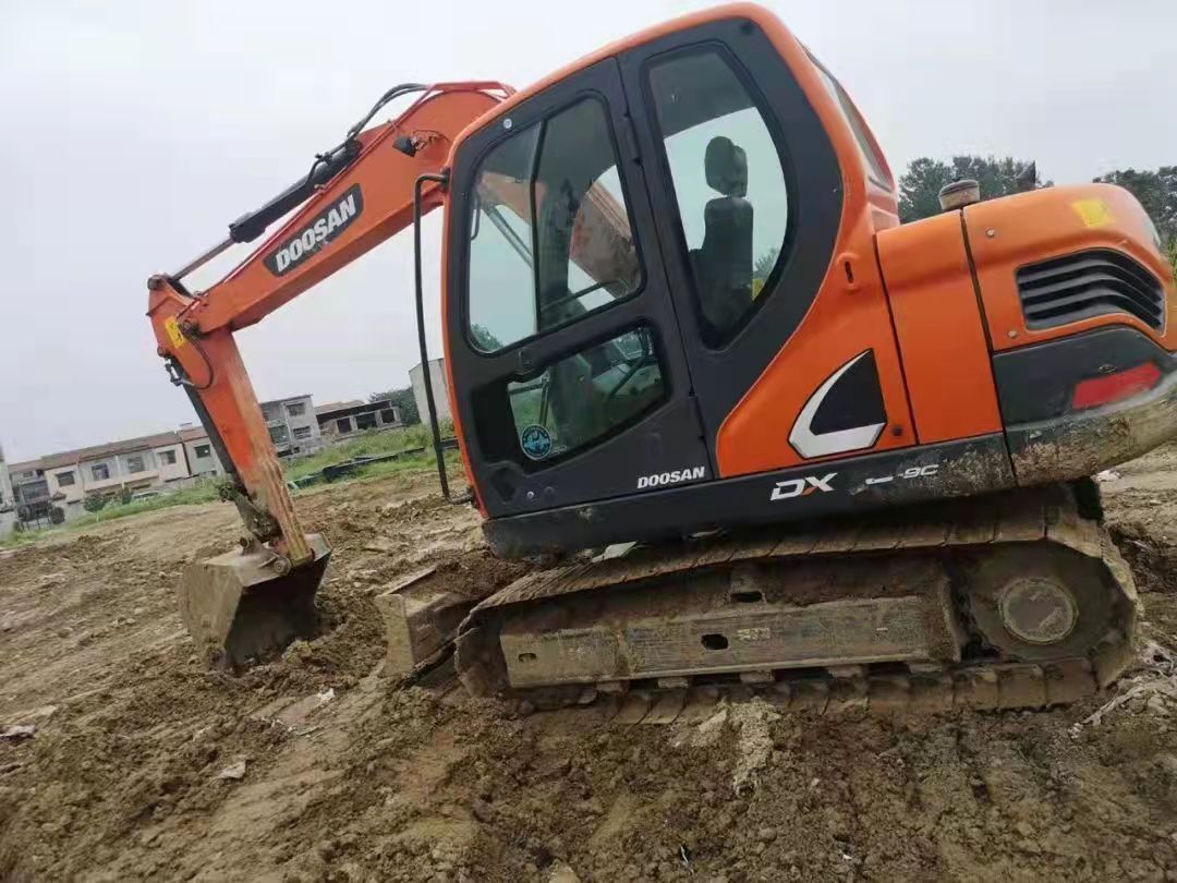 Doosan DX75-9C excavator, side view Doosan DX75-9C excavator, side view