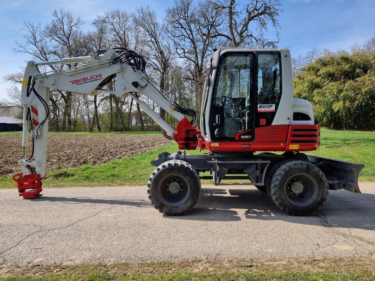 2015 Takeuchi TB295W wheel excavator, side view 2015 Takeuchi TB295W wheel excavator, side view
