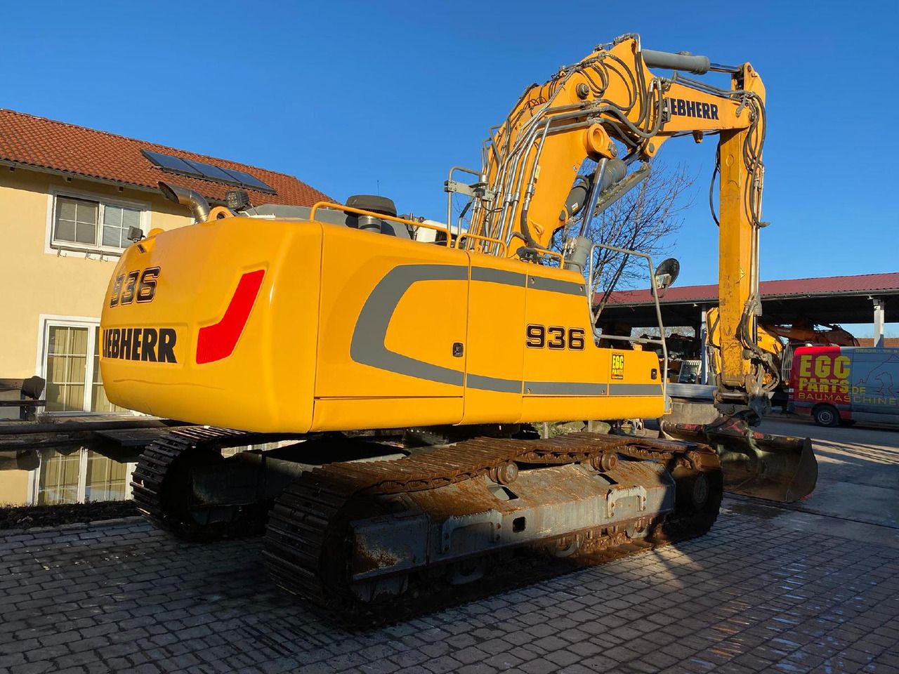 2016 Liebherr R936 NLC crawler excavator, rear three-quarter view 2016 Liebherr R936 NLC crawler excavator, rear three-quarter view