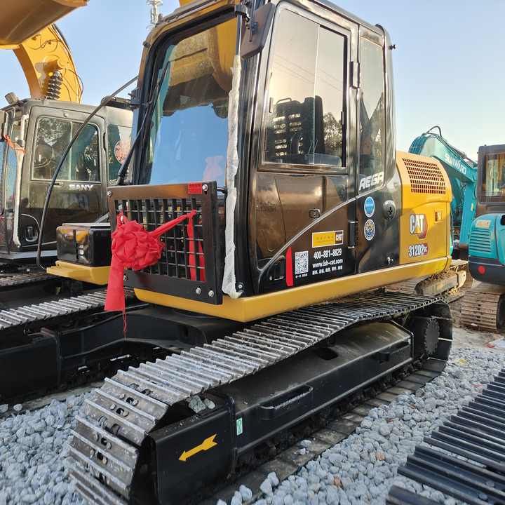 2022 Caterpillar 312D2 crawler excavator, side view of cab and tracks
