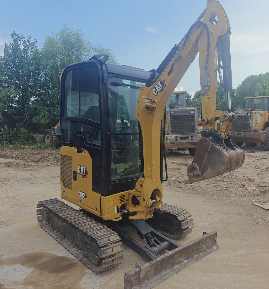 2020 Caterpillar 302CR mini excavator, front three-quarter view