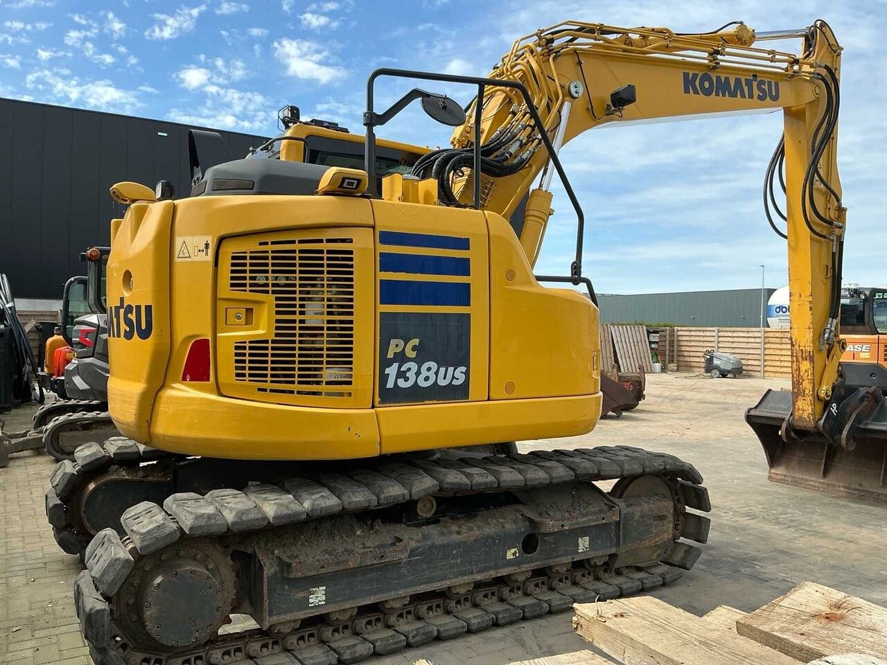 2019 Komatsu PC138US crawler excavator, rear three-quarter view 2019 Komatsu PC138US crawler excavator, rear three-quarter view