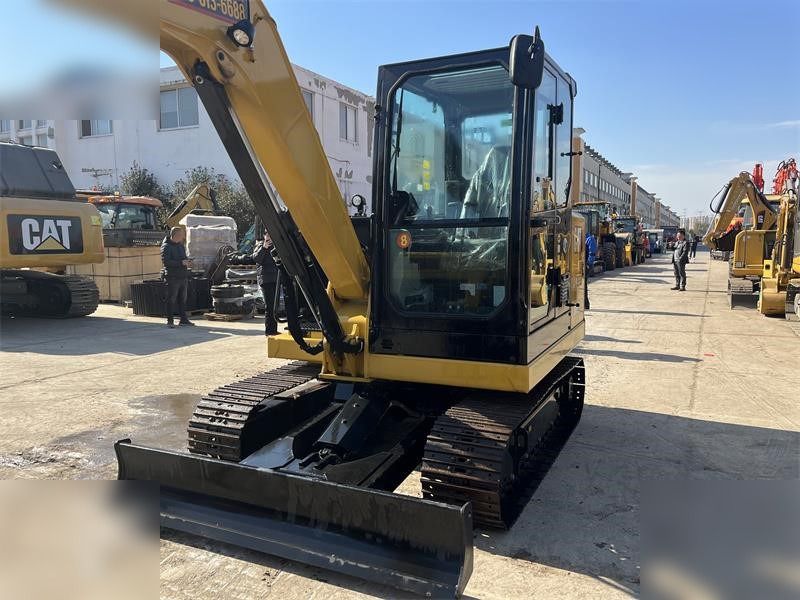 2024 Caterpillar 305.5E2 mini excavator, front three-quarter view 2024 Caterpillar 305.5E2 mini excavator, front three-quarter view