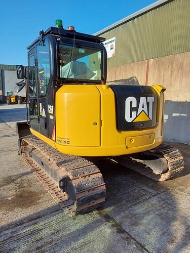 2019 Caterpillar 308E2CR crawler excavator, rear three-quarter view 2019 Caterpillar 308E2CR crawler excavator, rear three-quarter view