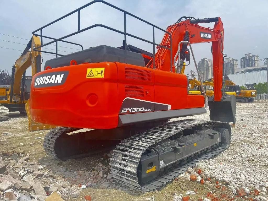 2023 Doosan DX300LC-9C excavator rear three-quarter view 2023 Doosan DX300LC-9C excavator rear three-quarter view