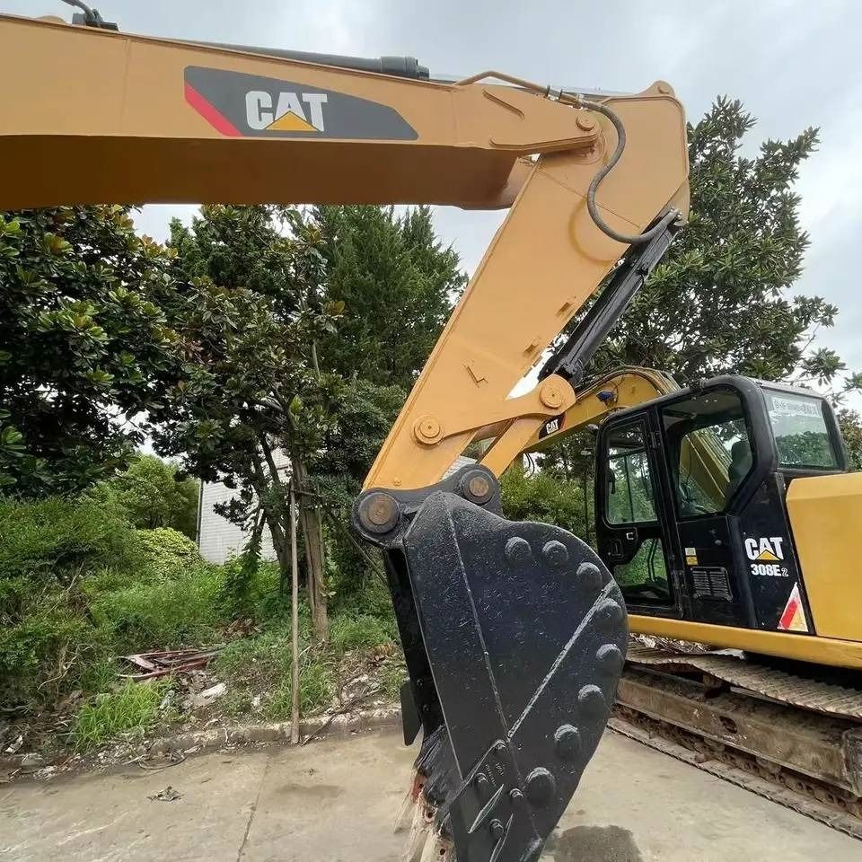 2023 Caterpillar 308E2 crawler excavator, side view of boom and bucket 2023 Caterpillar 308E2 crawler excavator, side view of boom and bucket