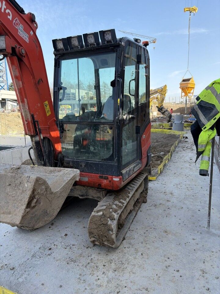 2022 Kubota KX027-4 mini excavator, front three-quarter view 2022 Kubota KX027-4 mini excavator, front three-quarter view