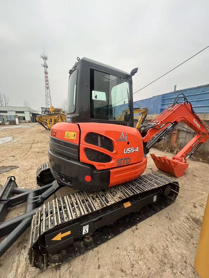 2024 Kubota U55-4 mini excavator, rear three-quarter view 2024 Kubota U55-4 mini excavator, rear three-quarter view