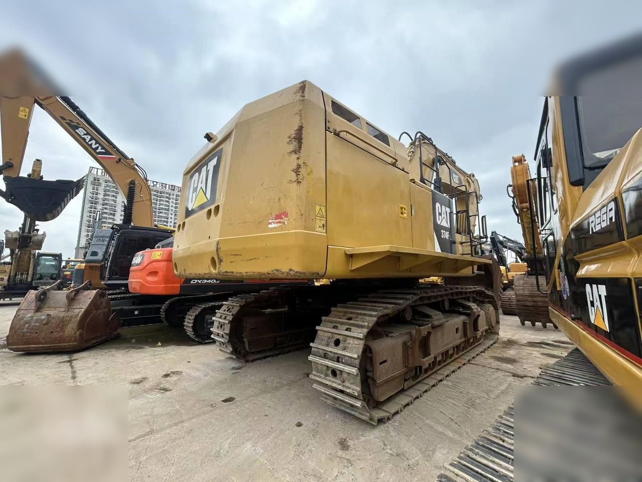 2025 Caterpillar 374FL crawler excavator, rear three-quarter view