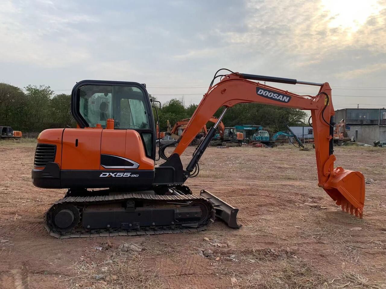 2018 Doosan DX55-9C excavator, side profile view