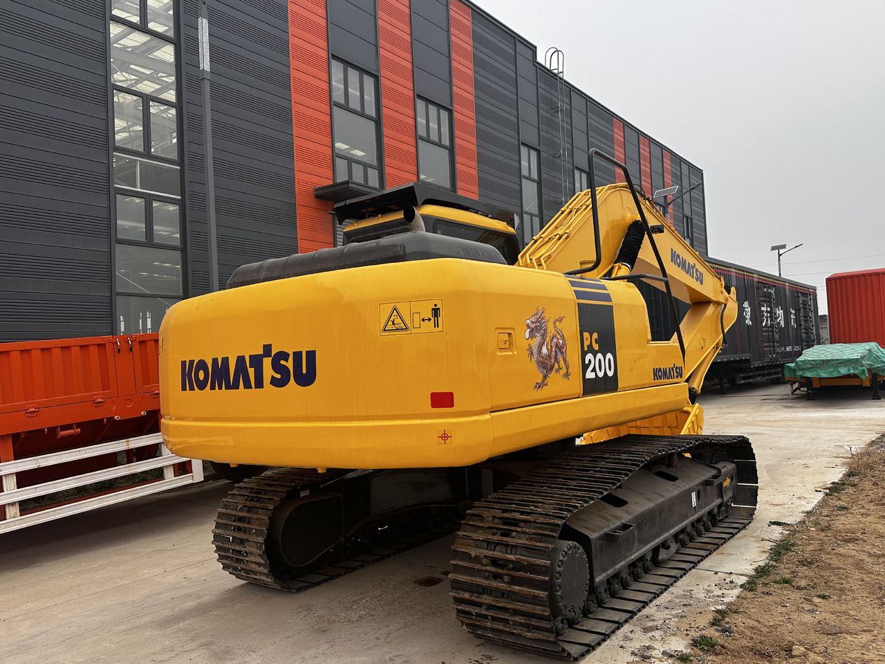 2022 Komatsu PC200 crawler excavator, rear three-quarter view