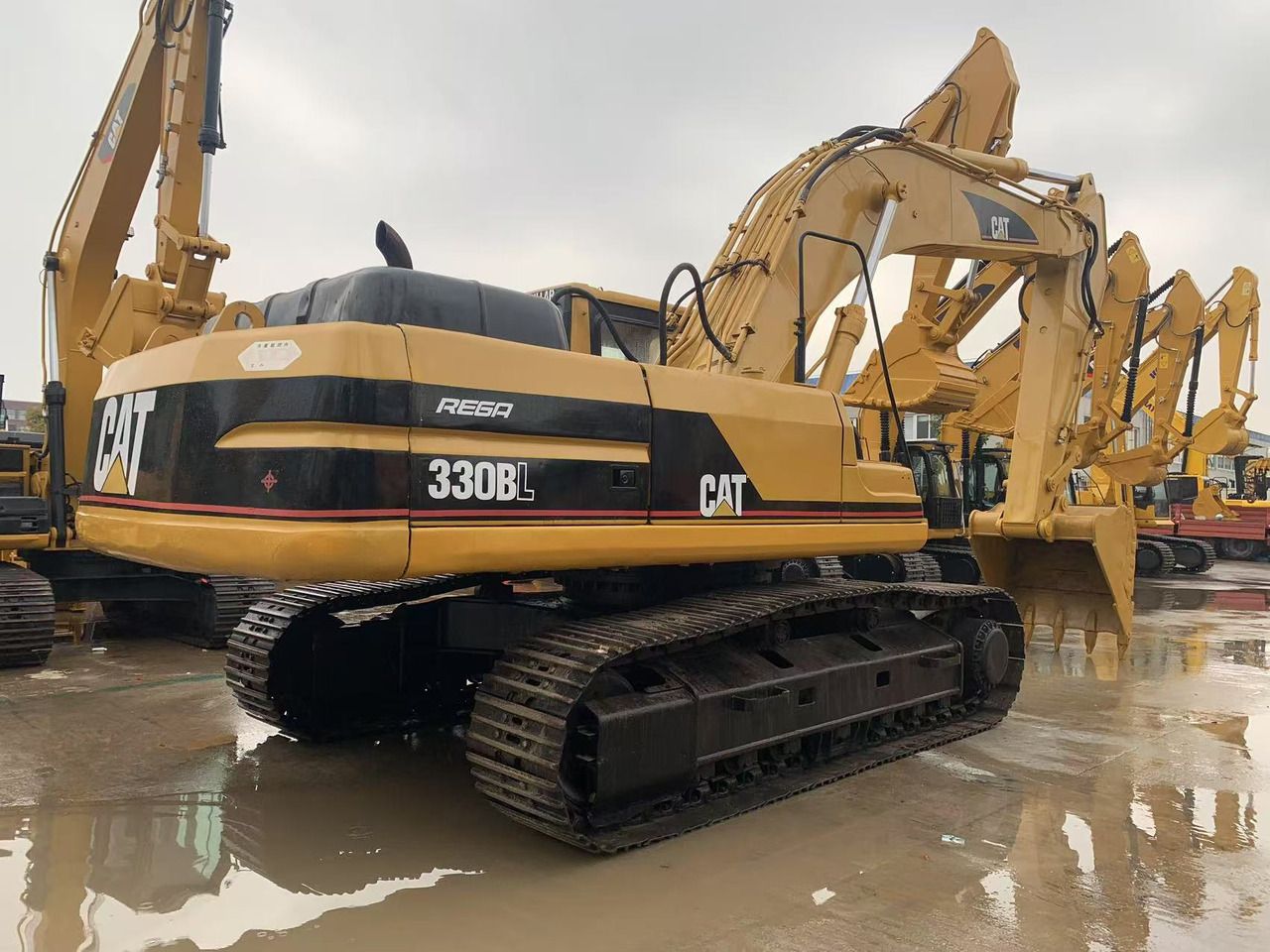 2018 Caterpillar 330BL crawler excavator, rear three-quarter view 2018 Caterpillar 330BL crawler excavator, rear three-quarter view