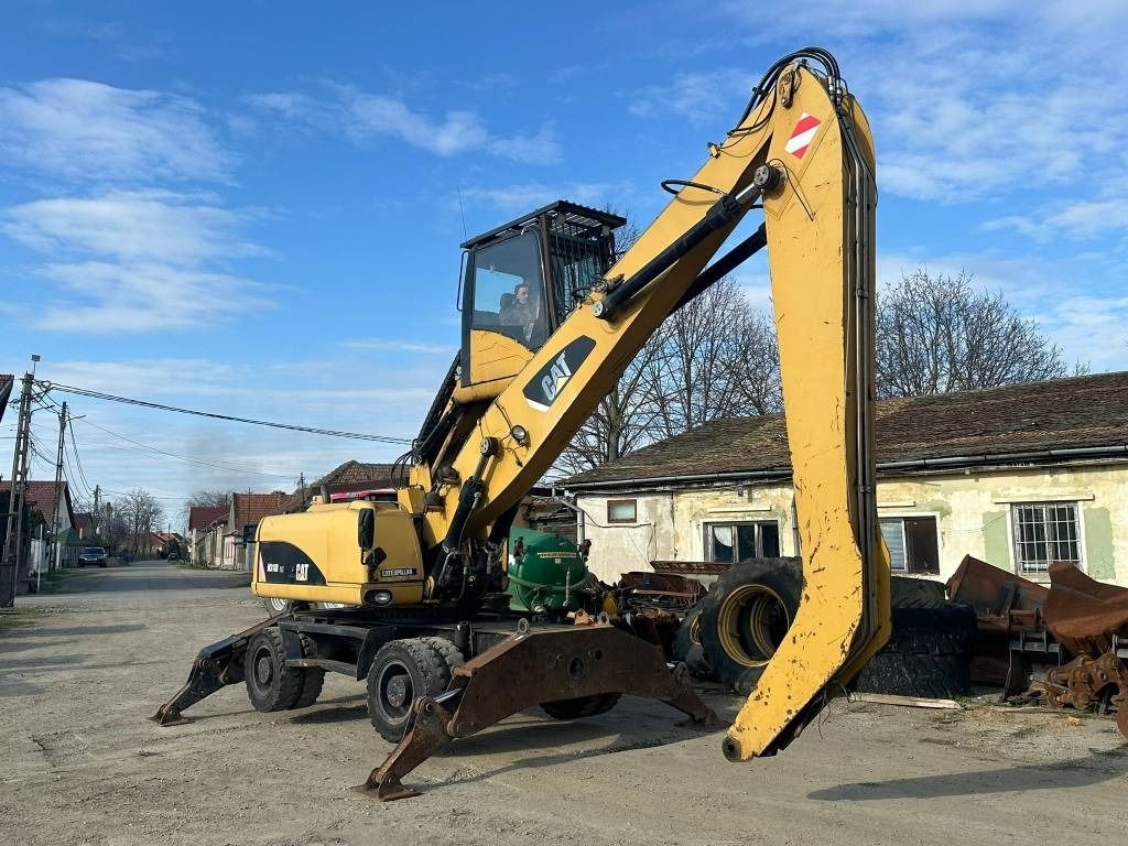 2008 Caterpillar M318D MH material handler, side view 2008 Caterpillar M318D MH material handler, side view
