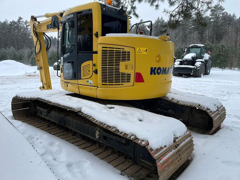 2014 Komatsu PC138US-10 crawler excavator, rear three-quarter view 2014 Komatsu PC138US-10 crawler excavator, rear three-quarter view