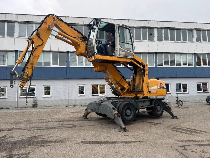 2009 Liebherr A316 LITRONIC material handler side view 2009 Liebherr A316 LITRONIC material handler side view