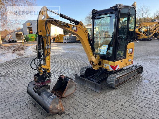 2022 Caterpillar 302-05A mini excavator, side view