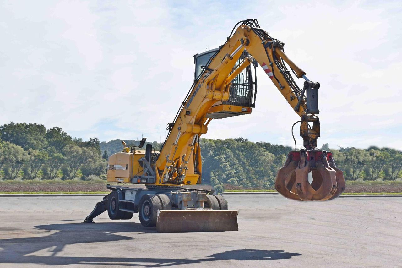 2008 Liebherr A316 wheel excavator, side view 2008 Liebherr A316 wheel excavator, side view