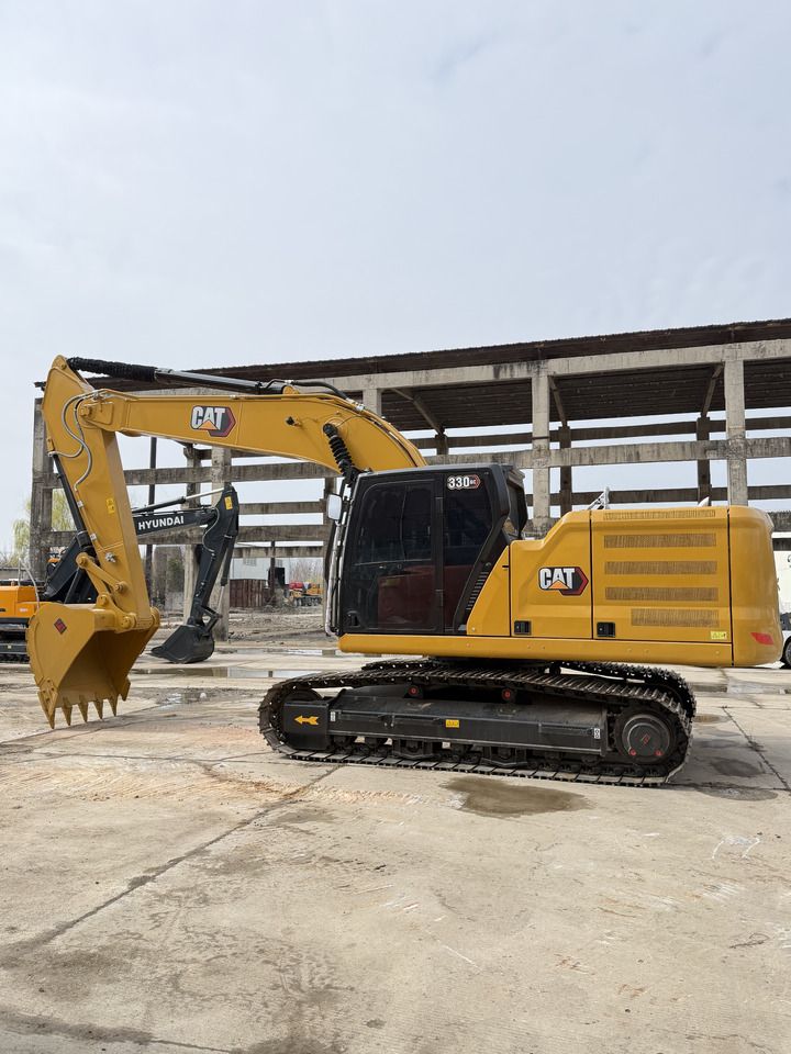 2023 Caterpillar 330GC crawler excavator, side profile view