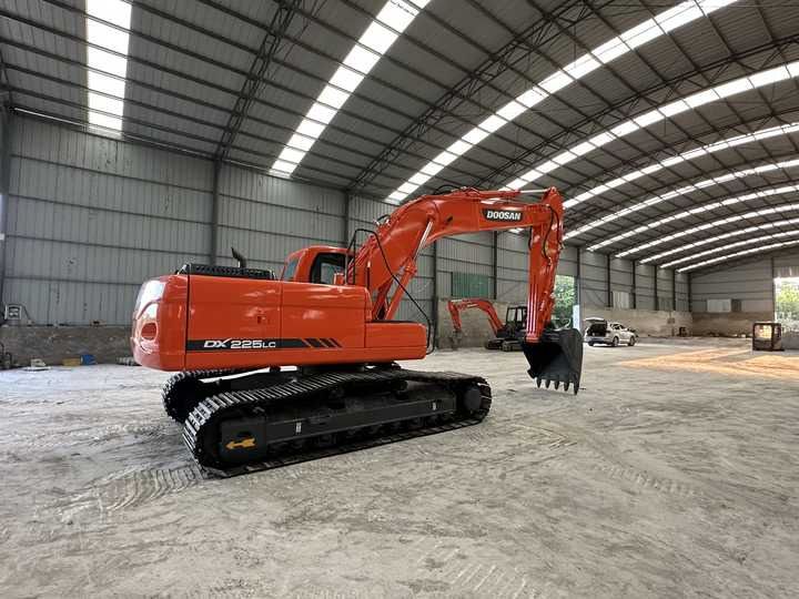 2020 Doosan DX225LC-9C crawler excavator, rear three-quarter view 2020 Doosan DX225LC-9C crawler excavator, rear three-quarter view