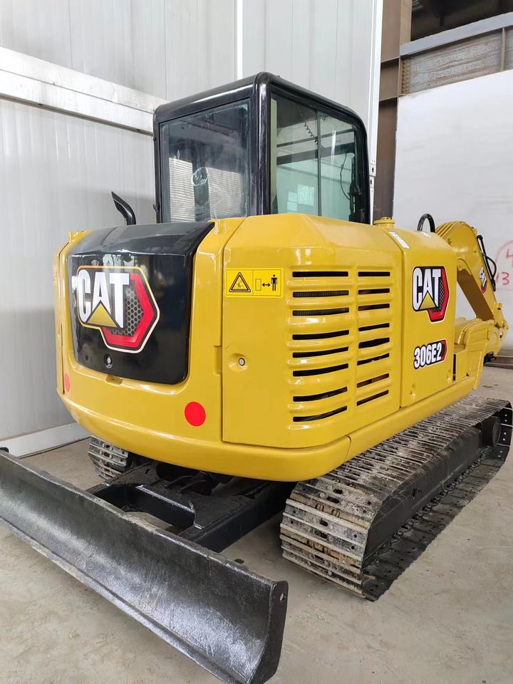2022 Caterpillar 306E2 mini excavator, rear three-quarter view