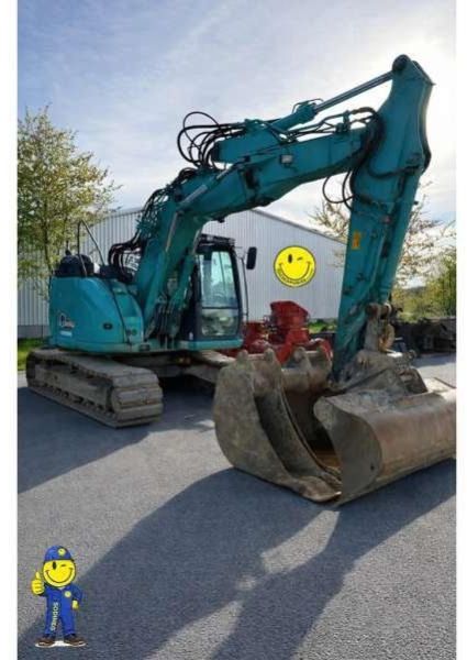 2016 Kobelco SK140SRLC-5 crawler excavator, front three-quarter view 2016 Kobelco SK140SRLC-5 crawler excavator, front three-quarter view
