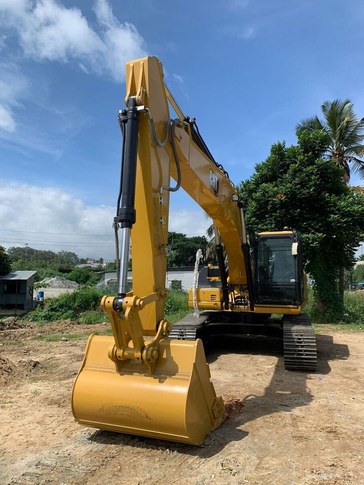 2025 Caterpillar 323D3 crawler excavator, front three-quarter view 2025 Caterpillar 323D3 crawler excavator, front three-quarter view