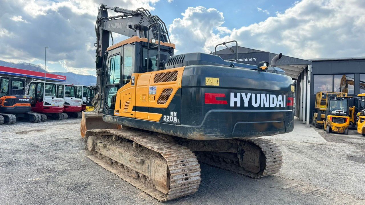 2023 Hyundai HX220AL crawler excavator, rear three-quarter view 2023 Hyundai HX220AL crawler excavator, rear three-quarter view