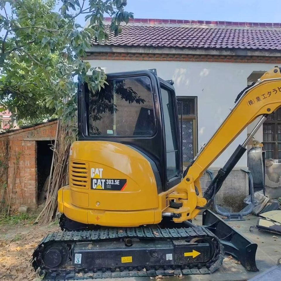 2022 Caterpillar 303.5E CR mini excavator side view 2022 Caterpillar 303.5E CR mini excavator side view