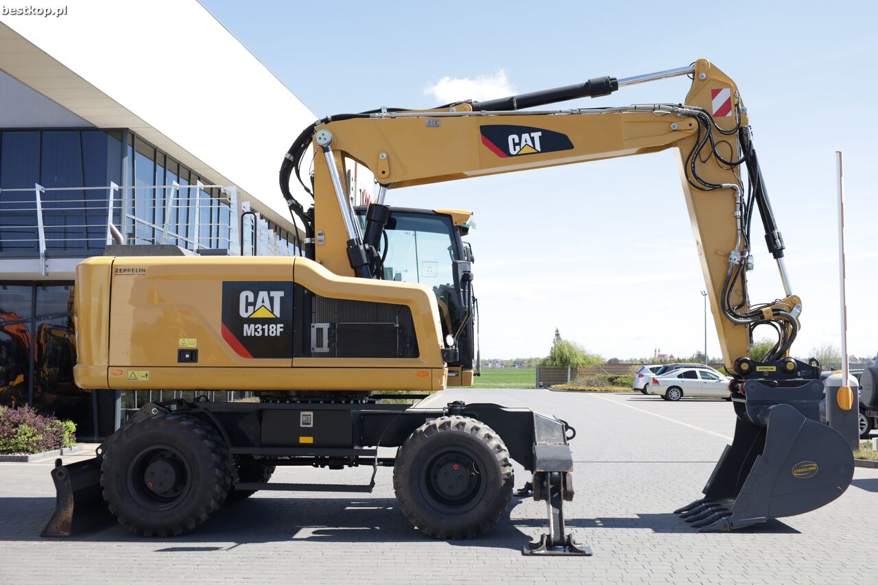 2016 Caterpillar M318F wheel excavator, side view 2016 Caterpillar M318F wheel excavator, side view