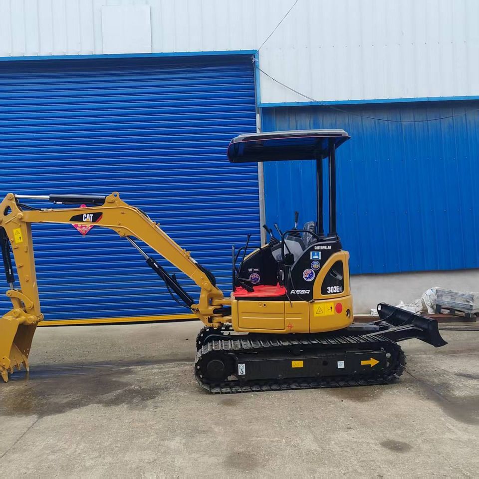 2022 Caterpillar 303E mini excavator, side profile view 2022 Caterpillar 303E mini excavator, side profile view