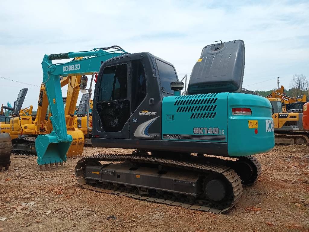 2023 Kobelco SK140LC crawler excavator, side view 2023 Kobelco SK140LC crawler excavator, side view