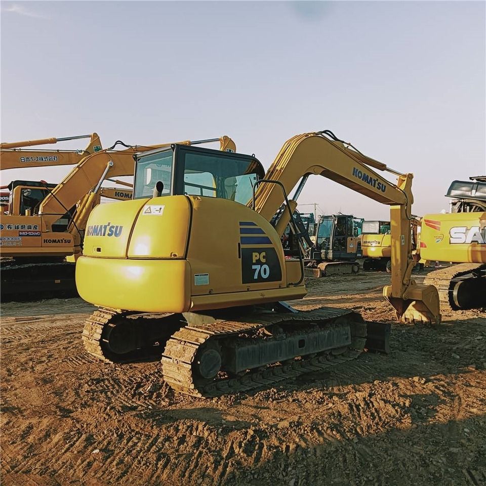 2024 Komatsu PC70-8 mini excavator, rear three-quarter view 2024 Komatsu PC70-8 mini excavator, rear three-quarter view
