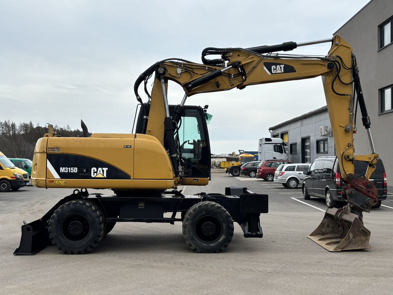 2012 Caterpillar M315D wheel excavator, side profile view 2012 Caterpillar M315D wheel excavator, side profile view