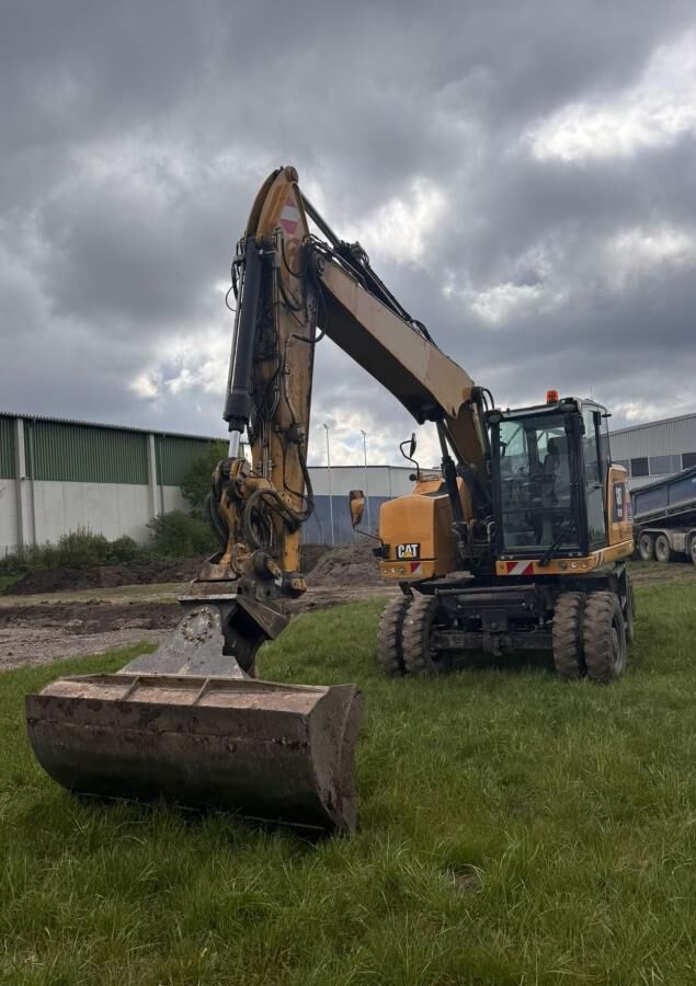 2020 Caterpillar M315F wheel excavator, front three-quarter view