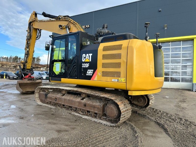 2017 Caterpillar 320FL crawler excavator, rear three-quarter view 2017 Caterpillar 320FL crawler excavator, rear three-quarter view