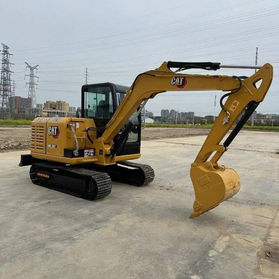 2022 Caterpillar 305.5E2 mini excavator, side view 2022 Caterpillar 305.5E2 mini excavator, side view
