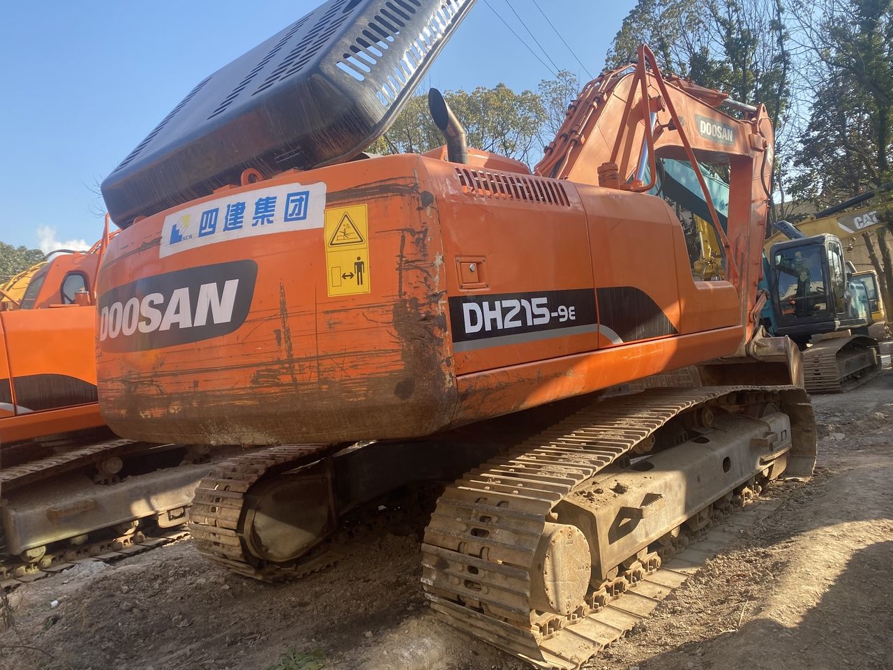 2011 Doosan DH215-9E crawler excavator, rear three-quarter view 2011 Doosan DH215-9E crawler excavator, rear three-quarter view